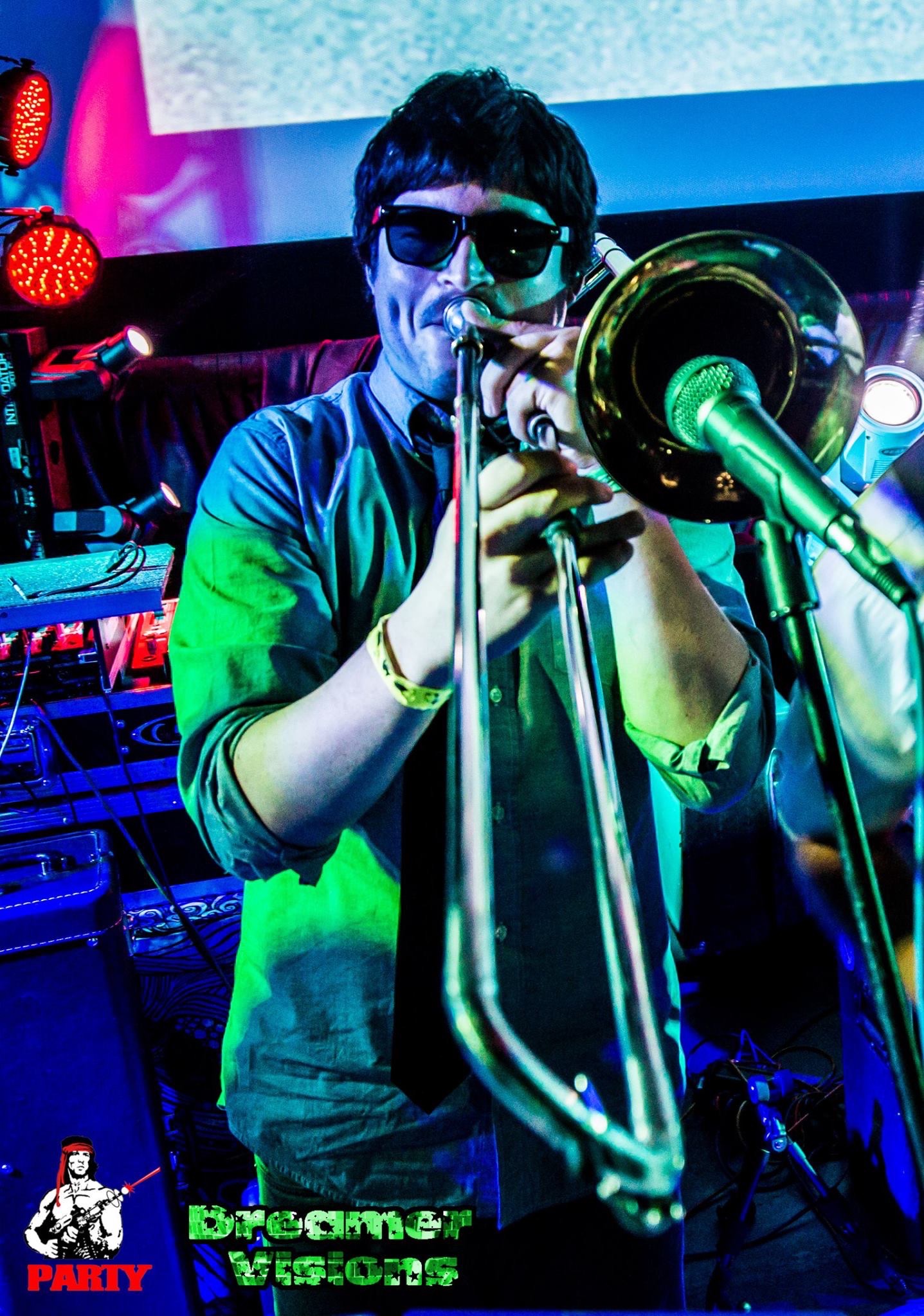 John Bennum in Shades playing the Trombone